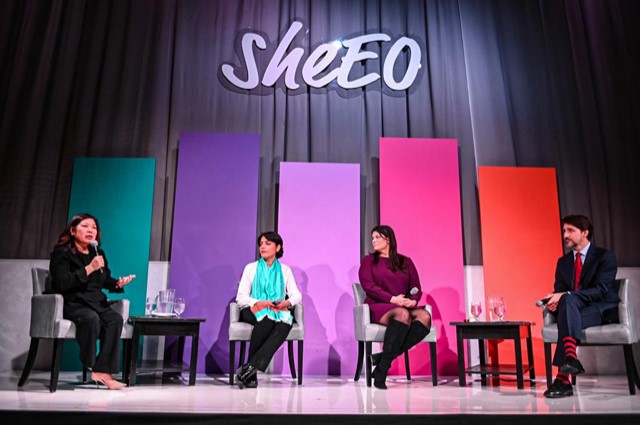 2019 CWI fellow, Margaret Magdesian (in turquoise scarf), discussing innovation and women entrepreneurship with Canadian Prime Minister Justin Trudeau, Minister Mary Ng and Patrice Mousseau from Satya Organic at the SheEO World Global Summit in Toronto, March 2020. Photo credited to Dahlia Katz.